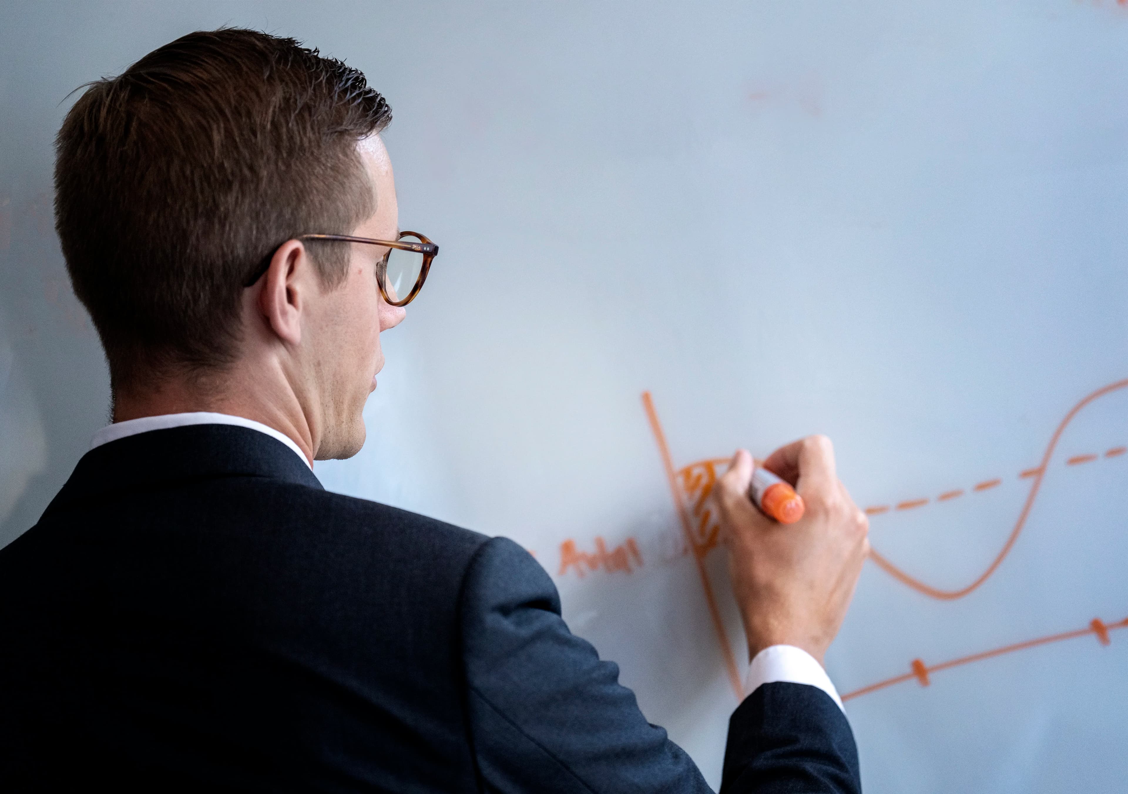 Person showing content on whiteboard